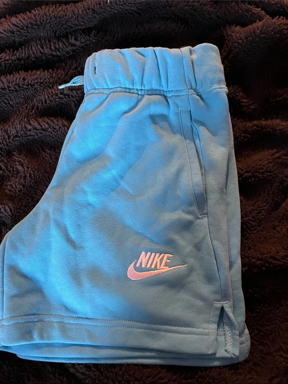 Nike Light Blue Shorts with Pink Swoosh Logo